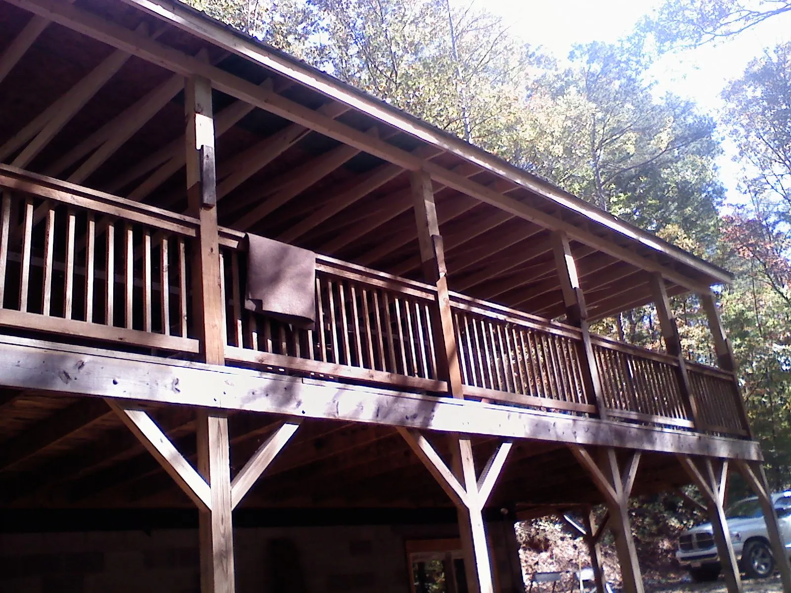 Timber framing under a new elevated porch and deck — Roof Leak Repair in Maple Park by Roofing Brothers
